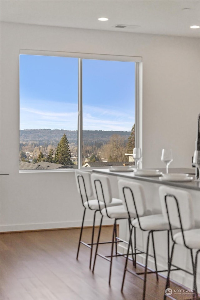 unfurnished dining area with hardwood / wood-style floors