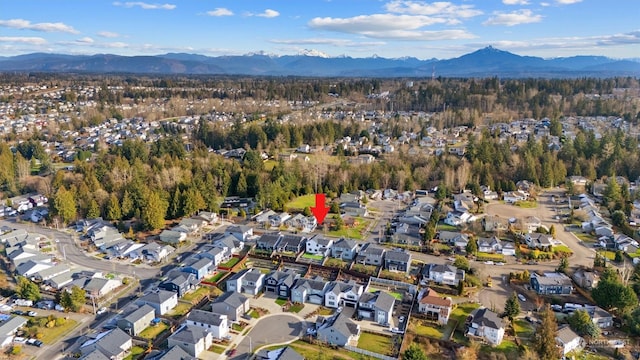 drone / aerial view featuring a mountain view