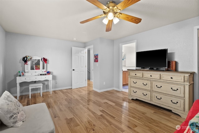 interior space with ceiling fan and light wood-type flooring