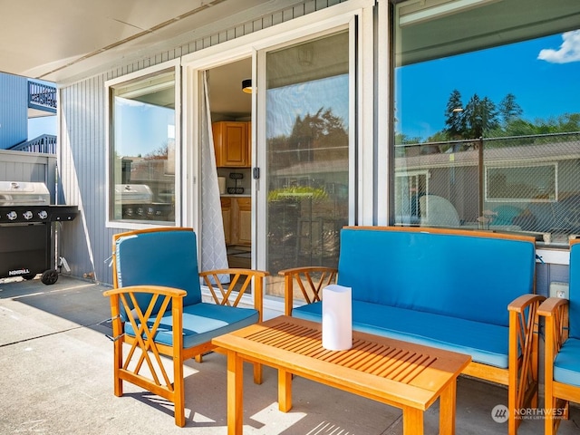 view of patio featuring a grill