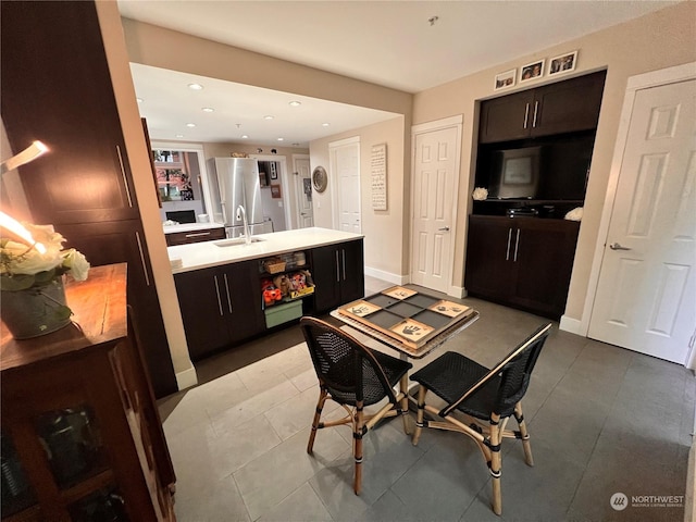 dining room featuring sink