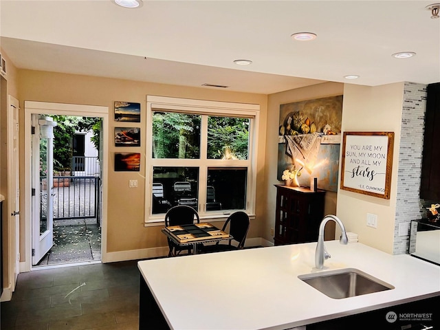 kitchen featuring sink and kitchen peninsula