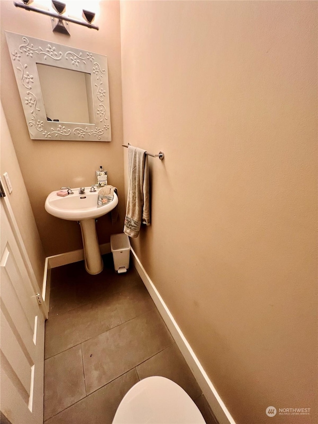 bathroom featuring tile patterned flooring