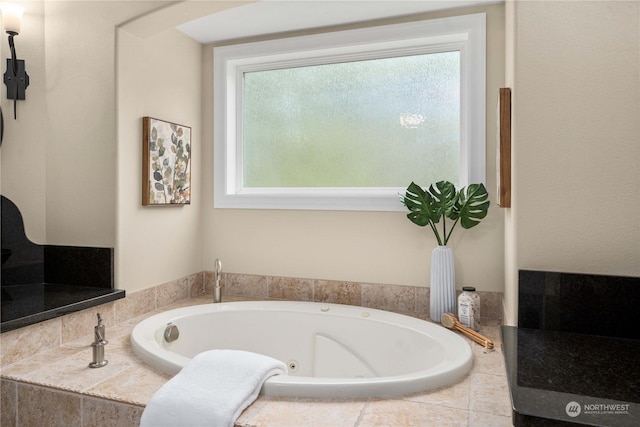 bathroom featuring a relaxing tiled tub