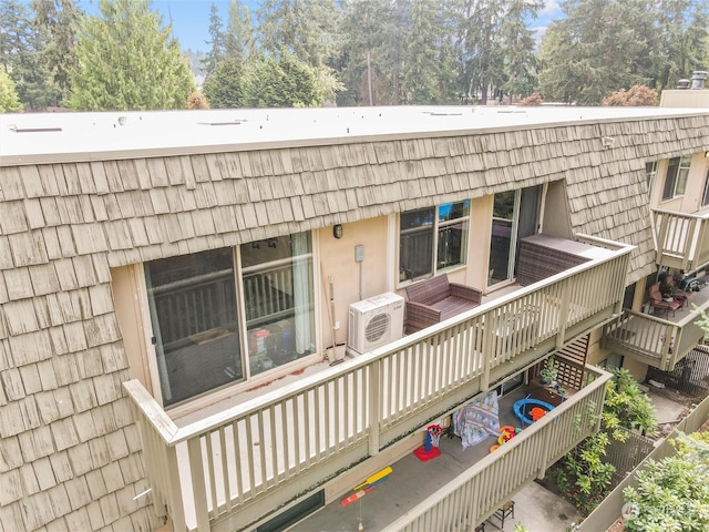 back of house featuring ac unit