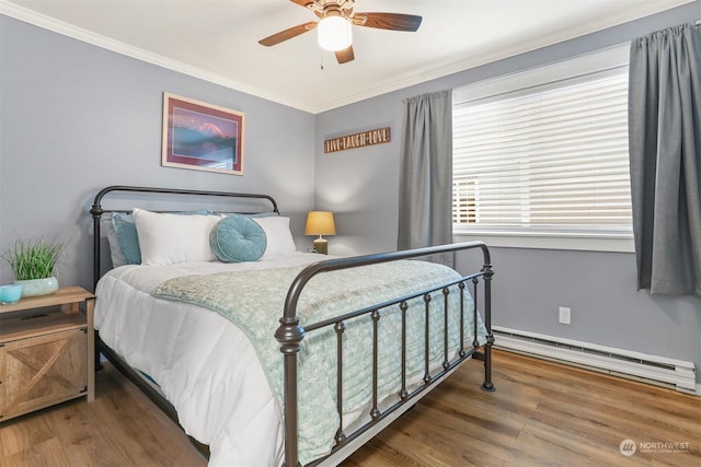 bedroom with dark wood-type flooring, a baseboard radiator, and ornamental molding