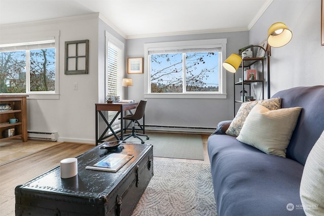 living room with ornamental molding, baseboard heating, and light hardwood / wood-style flooring