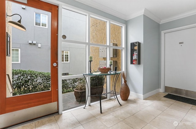 doorway to outside with crown molding and light tile patterned flooring