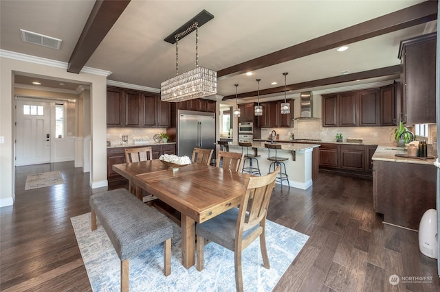 dining area featuring visible vents, beamed ceiling, baseboards, and dark wood-style flooring