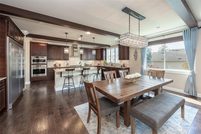 dining room featuring recessed lighting, baseboards, beam ceiling, and dark wood-style flooring