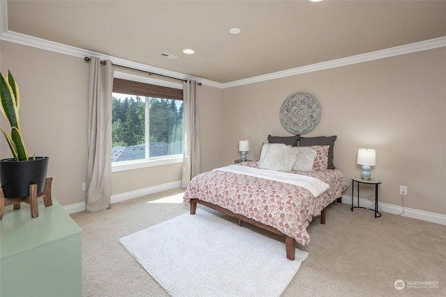 bedroom with visible vents, light colored carpet, and crown molding