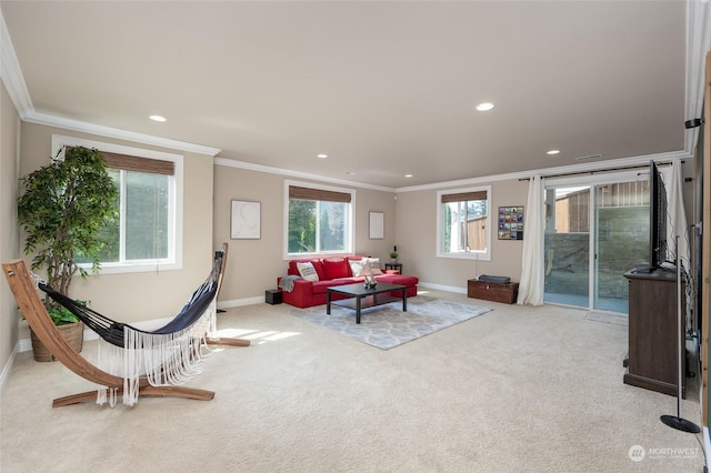 carpeted living room with recessed lighting, baseboards, and ornamental molding