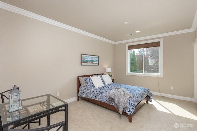 bedroom with baseboards, light colored carpet, visible vents, and ornamental molding