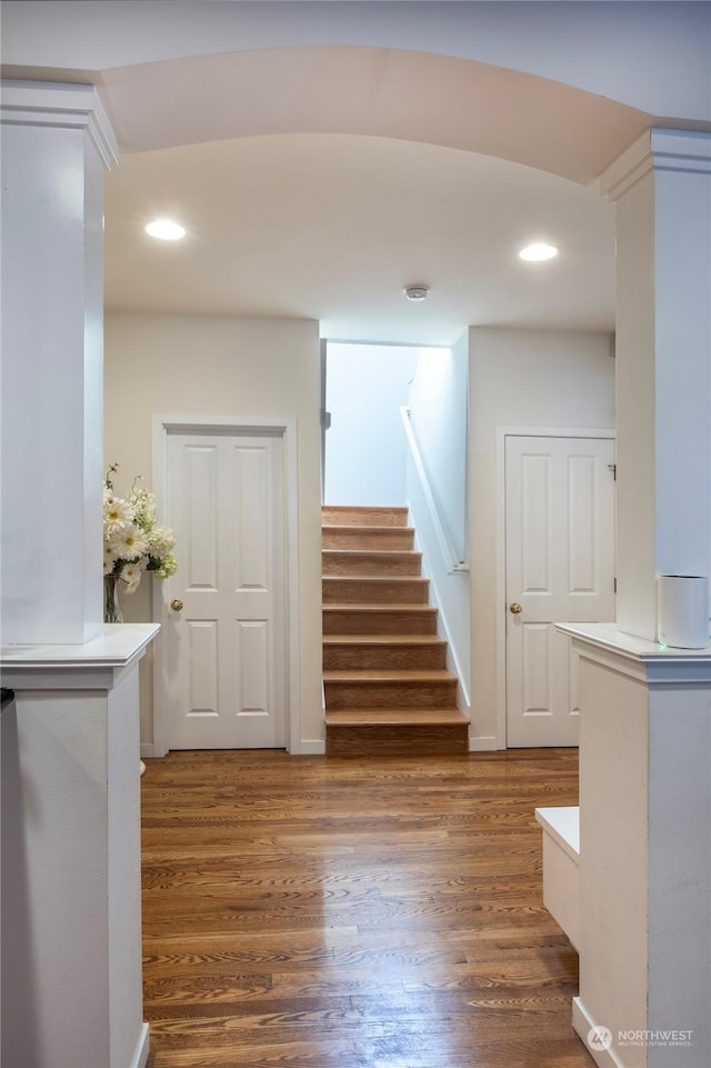 staircase featuring hardwood / wood-style floors