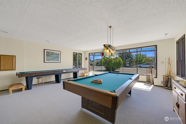 playroom featuring light carpet, a textured ceiling, and billiards