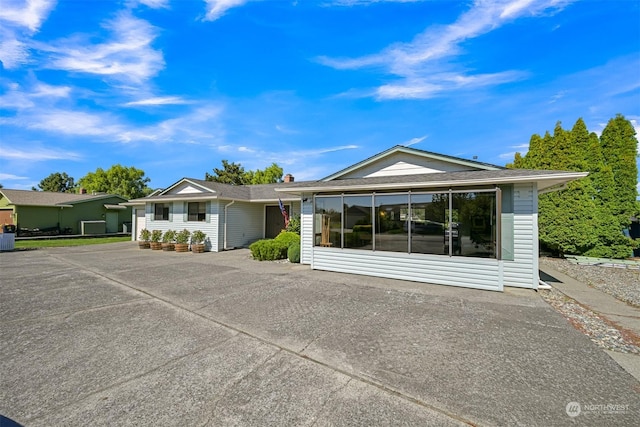 ranch-style house with central AC