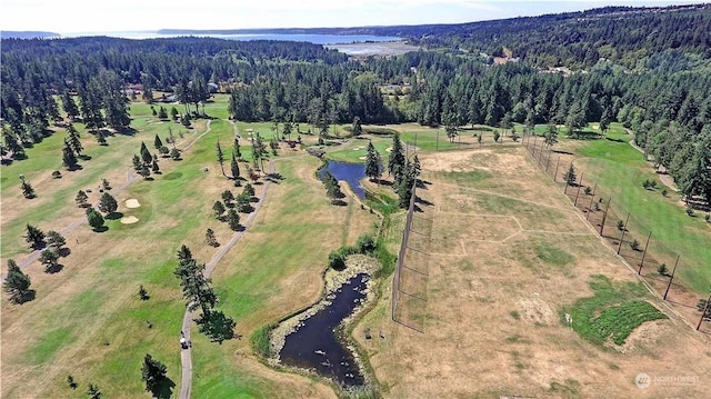 birds eye view of property featuring a water view and a rural view