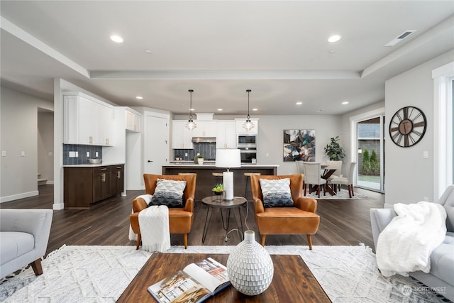 living room featuring dark hardwood / wood-style flooring