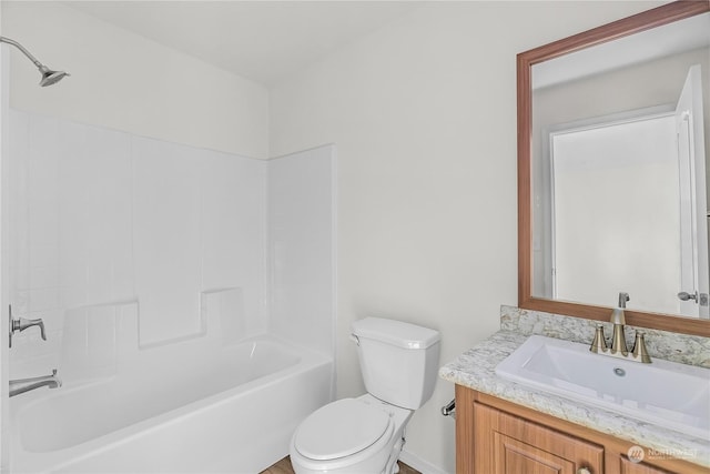 full bathroom featuring vanity, toilet, and shower / tub combination