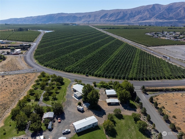 birds eye view of property featuring a rural view and a mountain view