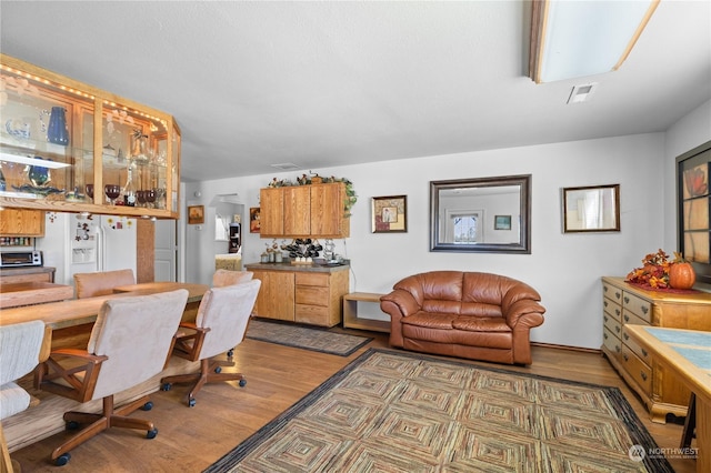 home office featuring hardwood / wood-style flooring