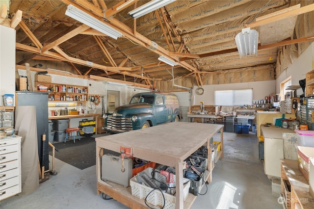 garage featuring a workshop area