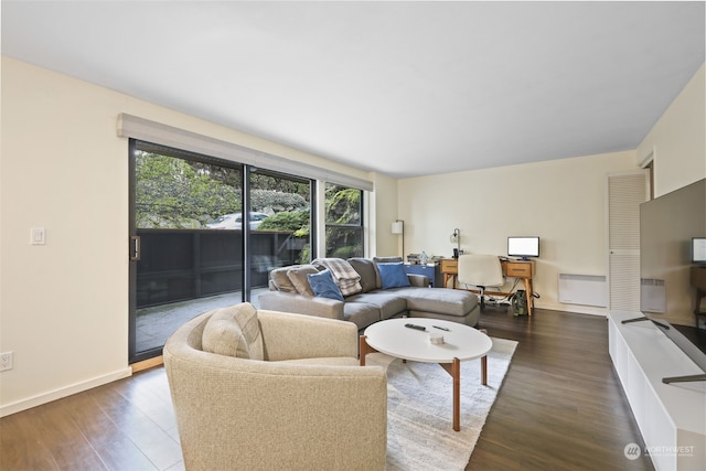 living room with dark hardwood / wood-style floors