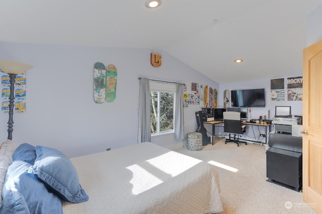 bedroom featuring vaulted ceiling and carpet floors