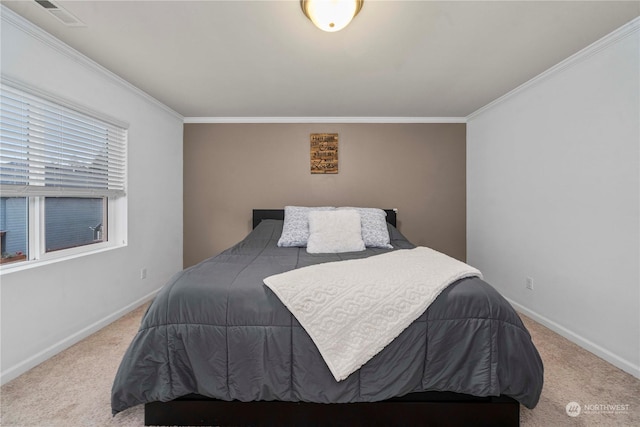 carpeted bedroom with ornamental molding