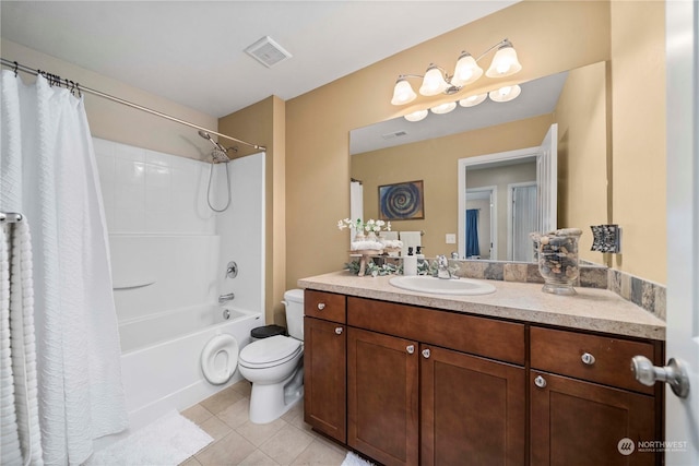 full bathroom featuring vanity, shower / bath combo, tile patterned floors, and toilet