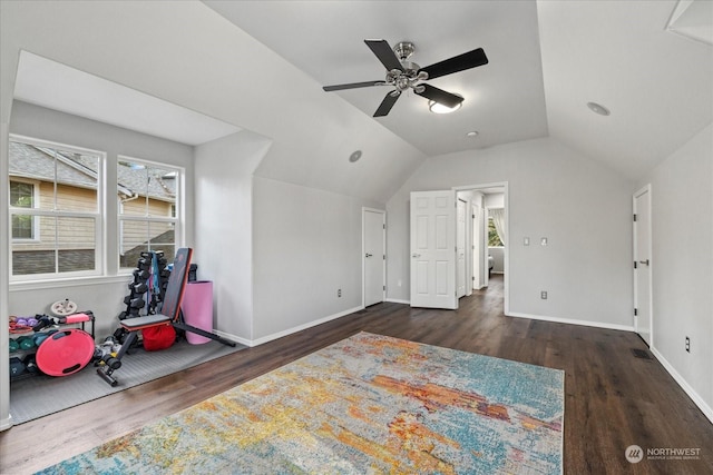 bedroom with dark wood-type flooring, ceiling fan, and vaulted ceiling