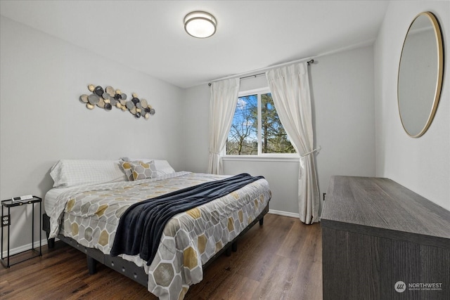 bedroom featuring dark wood-type flooring