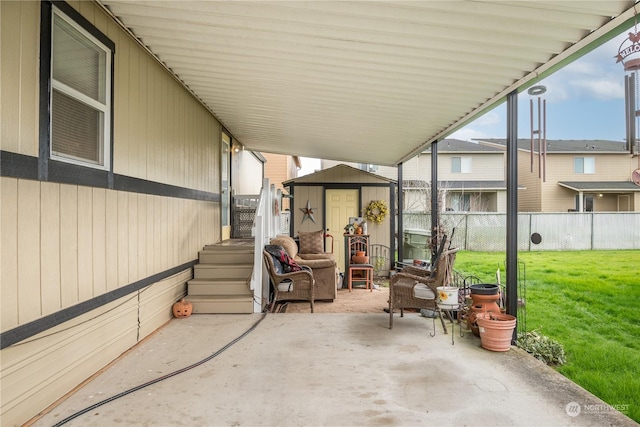 view of patio / terrace with a storage shed