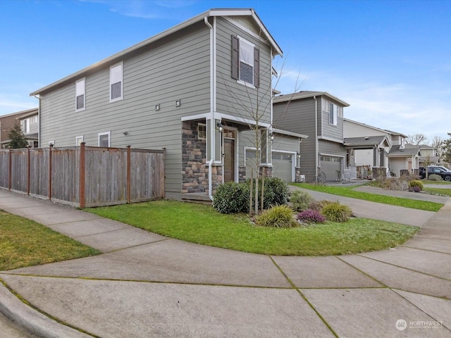 view of side of property featuring a garage