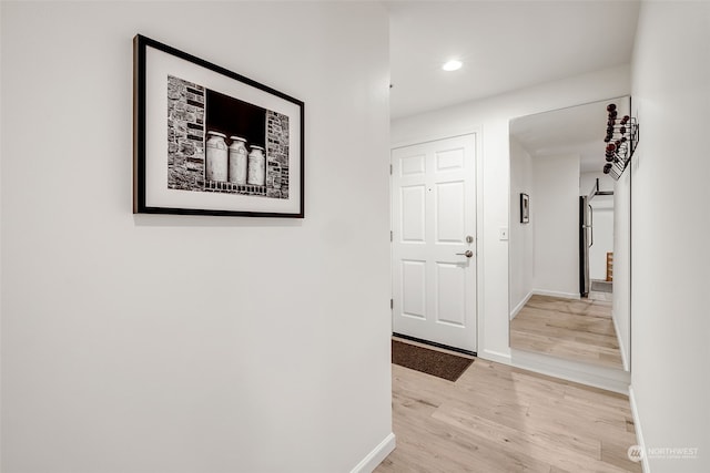 hall featuring light wood-type flooring