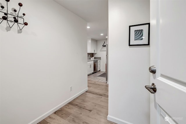 corridor featuring light hardwood / wood-style flooring