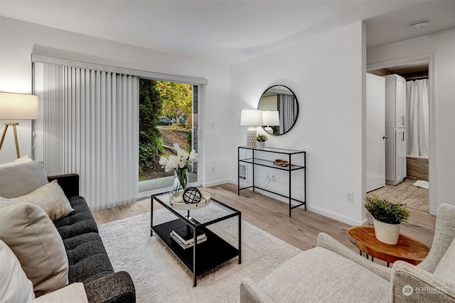 living room featuring light wood-type flooring