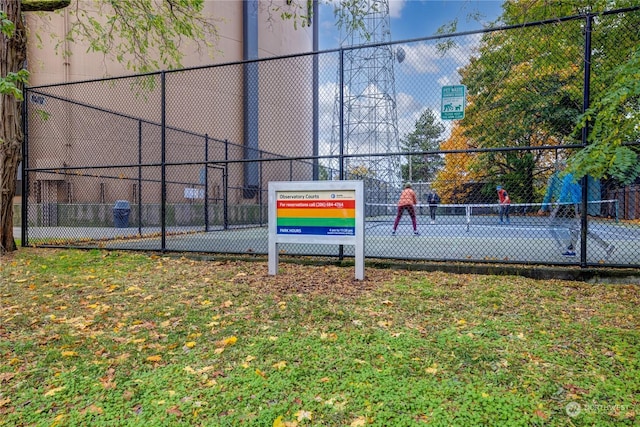 view of community with tennis court