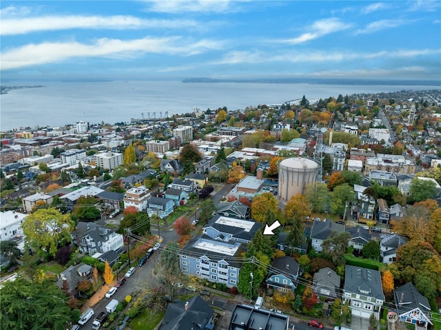 birds eye view of property featuring a water view