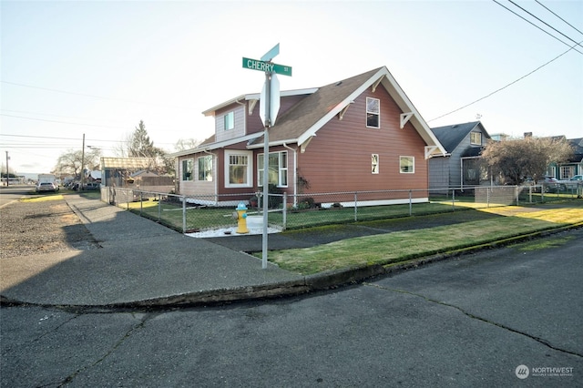 view of home's exterior with a lawn