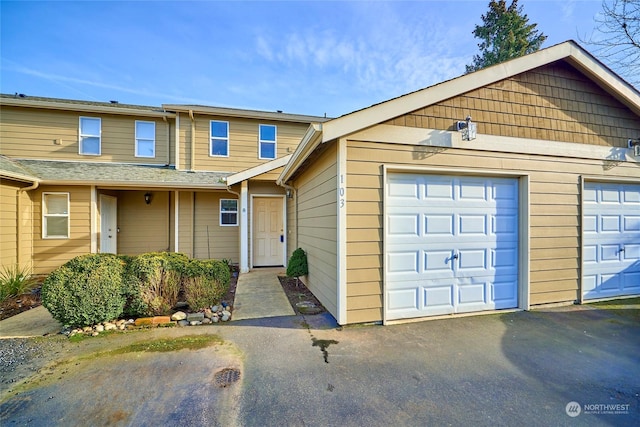 view of front of property featuring a garage