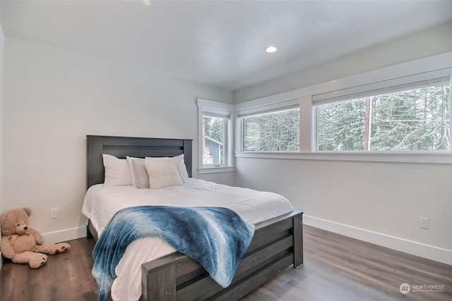 bedroom featuring hardwood / wood-style flooring