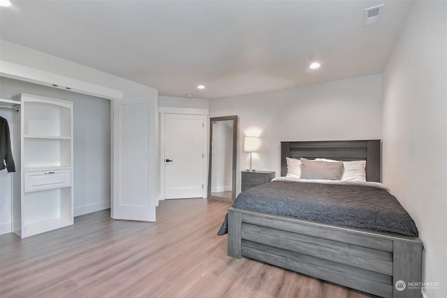 bedroom featuring light hardwood / wood-style flooring