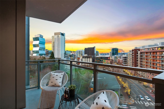 view of balcony at dusk