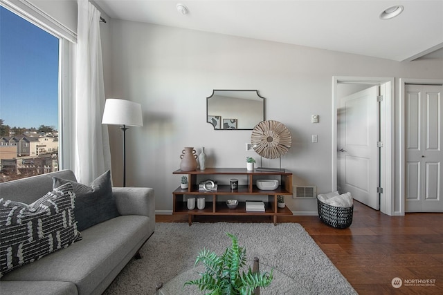 living room featuring dark hardwood / wood-style floors