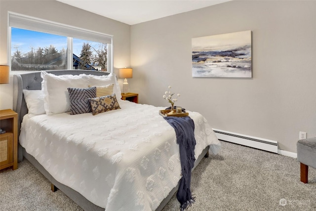 bedroom with baseboard heating and light colored carpet