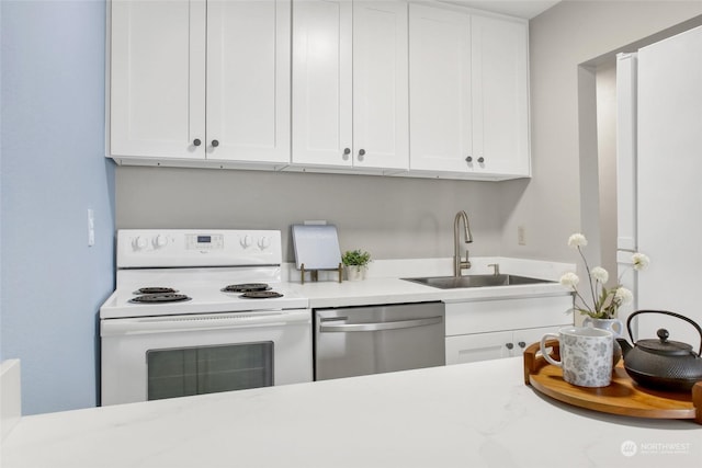 kitchen with light stone countertops, white cabinetry, white electric stove, sink, and stainless steel dishwasher