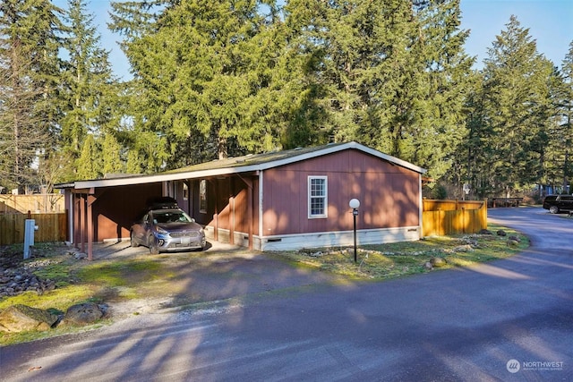 exterior space featuring a carport