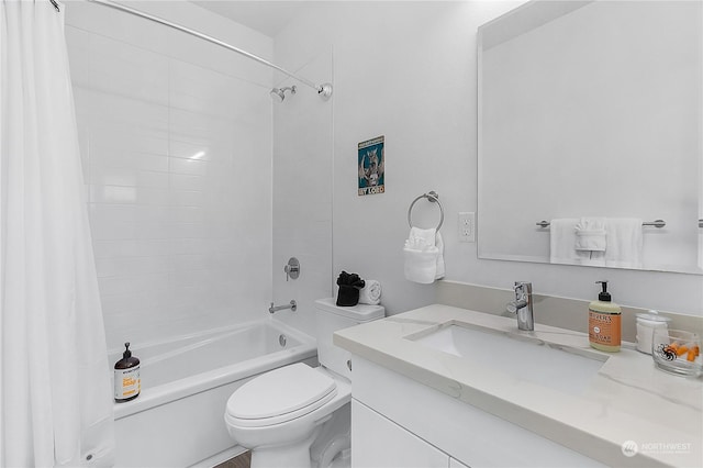 full bathroom featuring shower / tub combo, vanity, and toilet