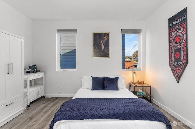 bedroom with light hardwood / wood-style flooring